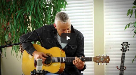 Tommy Emmanuel playing guitar